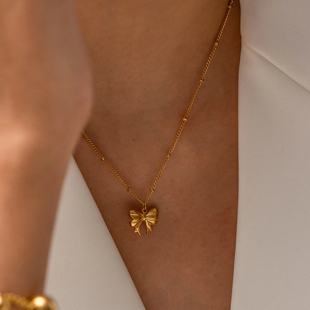 Uworld New Arrival 18K Gold Plated Charm Necklace Stainless Steel Bow Pendant Necklace for Women Trendy Charm Jewelry Waterproof
