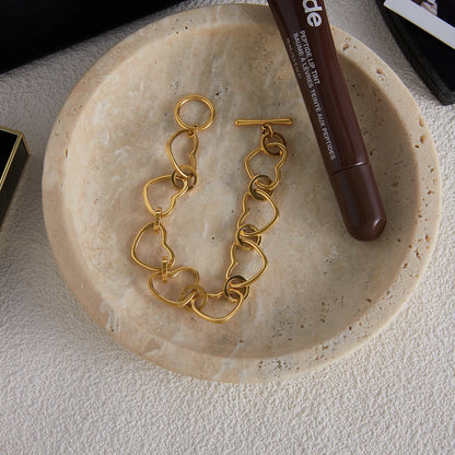 Uworld Classic Fashion 18K Gold Color Plated Hollow Heart Shape Chain OT Buckle Bracelet Waterproof Stainless Steel Jewelry Gift